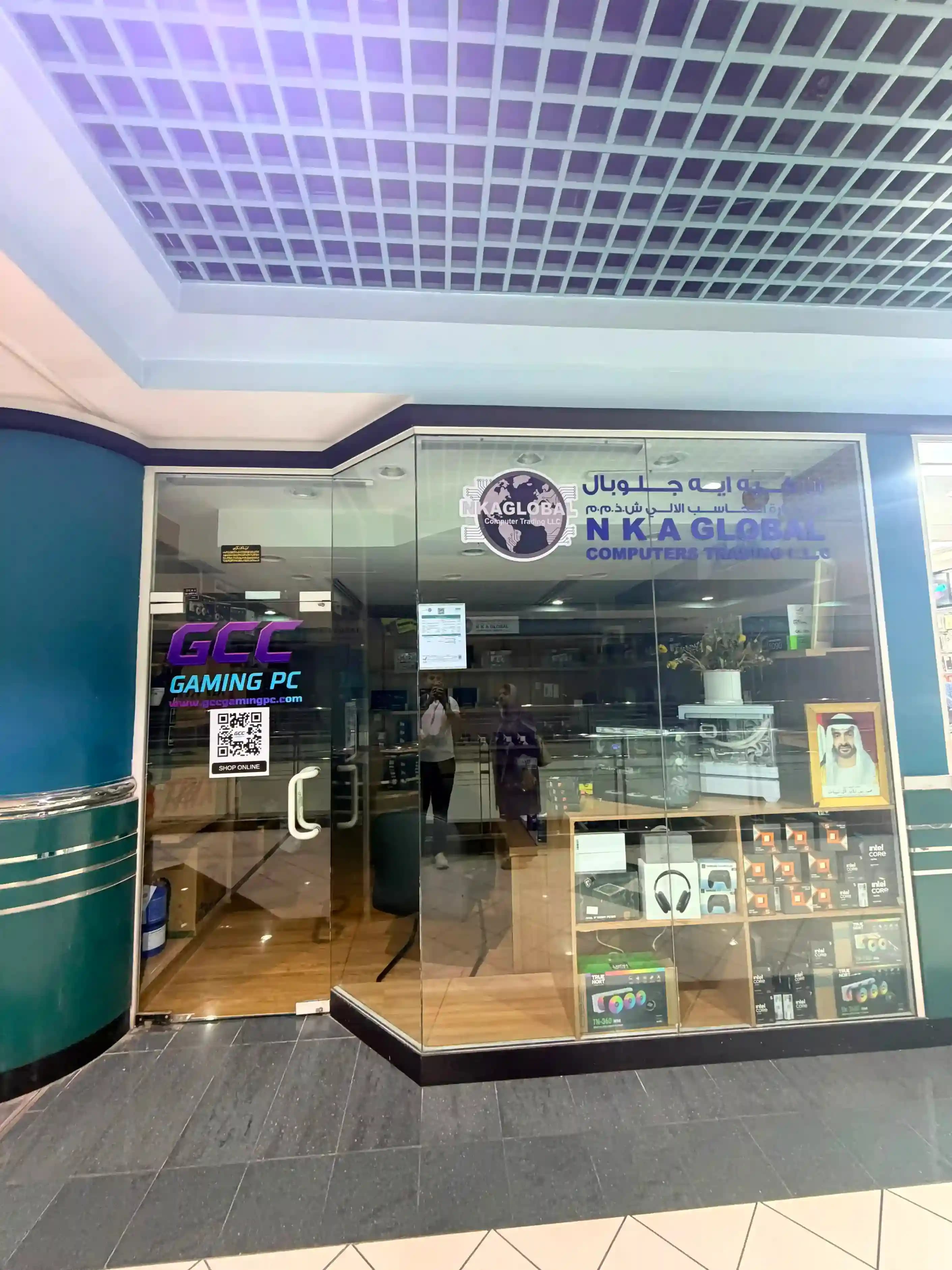 GCC Gaming PC storefront facade with glass display of PC components at Al Khaleej Center, Dubai