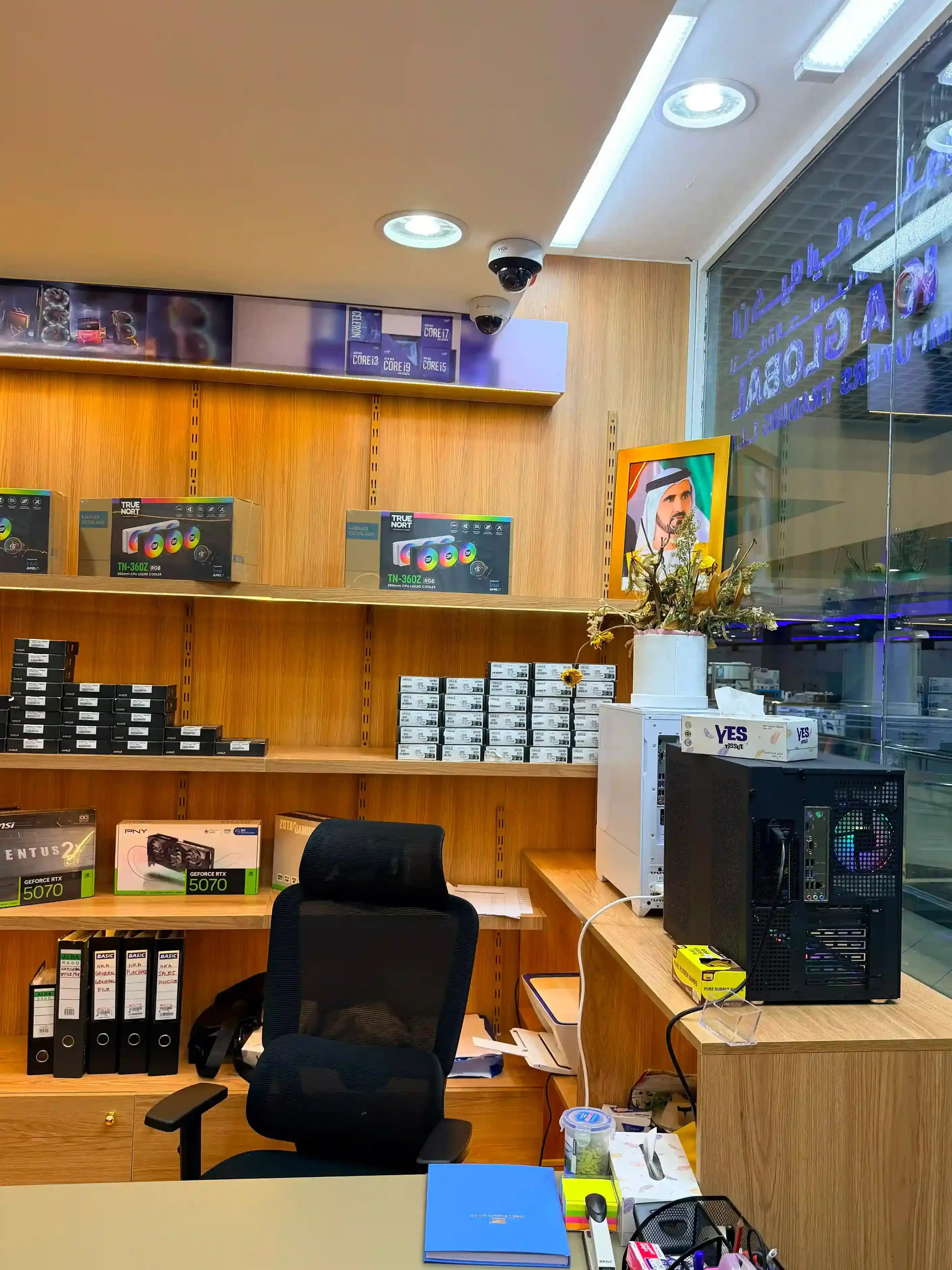 Service and support desk at GCC Gaming PC with components shelf and test PCs, Bur Dubai